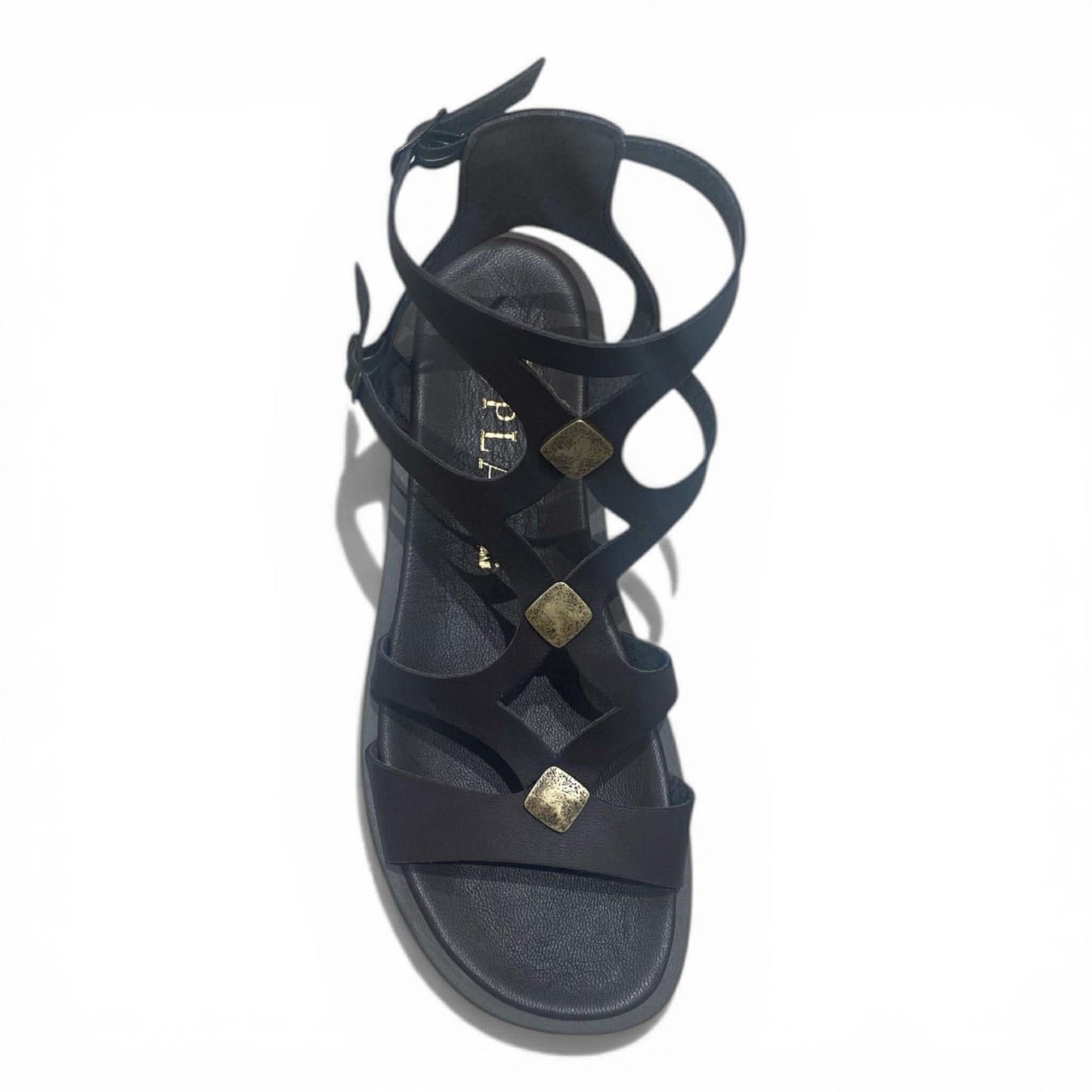 Sandalo gladiatore in pelle testa di moro con dettagli metallici