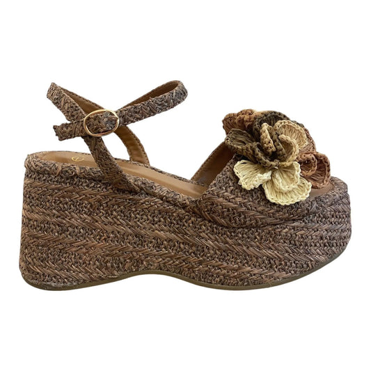 La Femme Ravenna brown woven platform wedge sandals with layered flower accent and ankle strap.